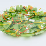 Large round glass tray in lime green, orange, yellow and red.