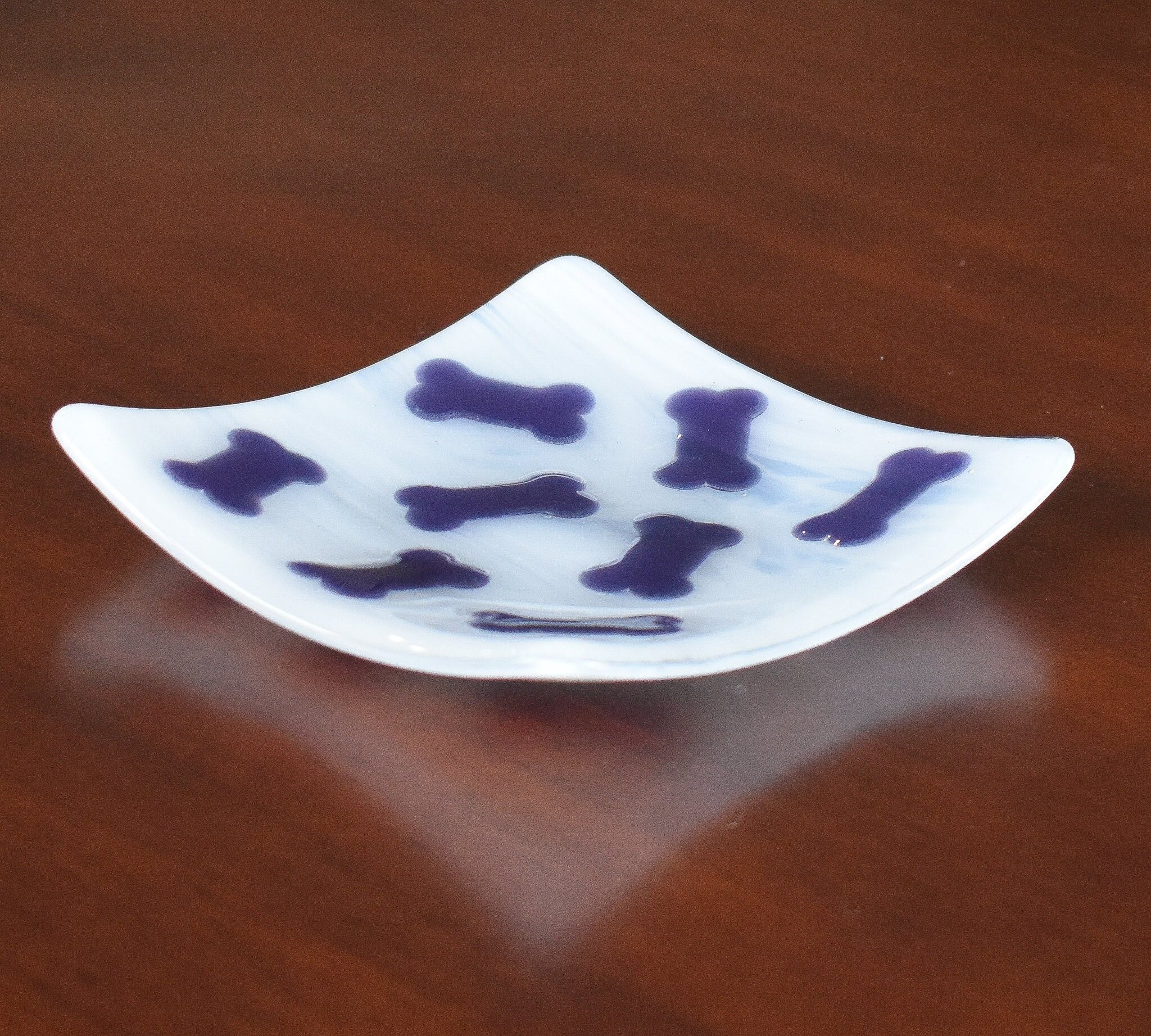 Square, white, glass tray decorated with purple dog bones