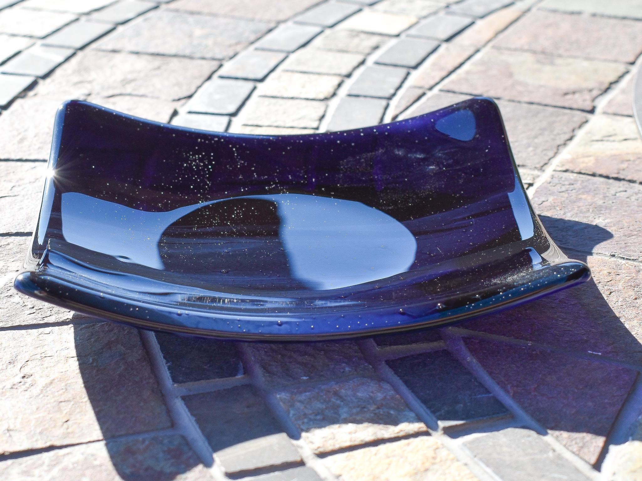 Deep transparent purple and white streaky glass formed into a 6&quot; square slightly sloped dish.