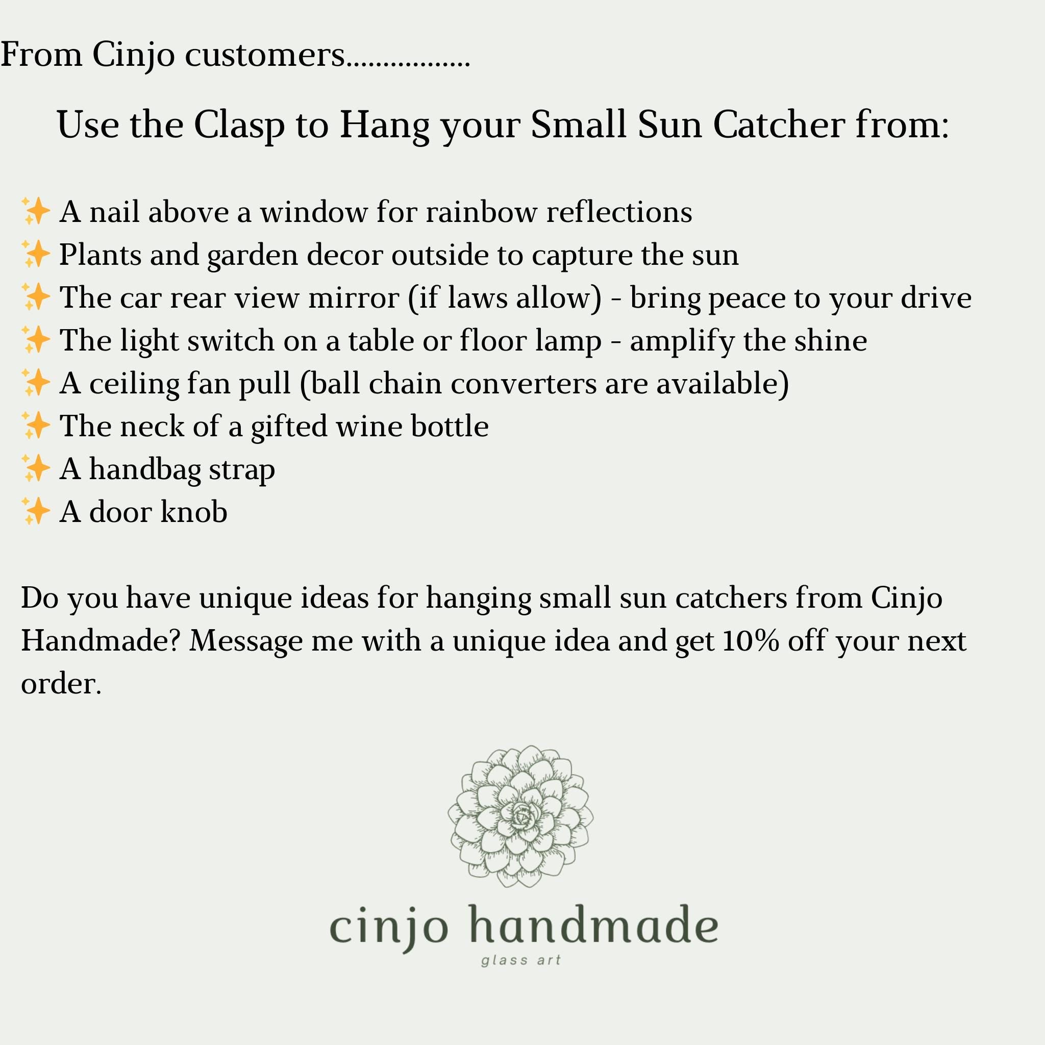 Text on a white background provides ideas for hanging small sun catchers from Cinjo Handmade. Suggestions include a nail above a window, plants and garden decor, a car mirror, a light switch, a ceiling fan pull, a wine bottle neck, a handbag strap, and a door knob. The Cinjo Handmade logo is at the bottom.