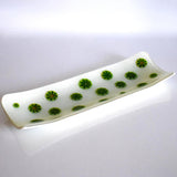 Rectangular glass tray with channel shape, 12 inches long, against white background. Tray has green and yellow accents fused into the glass that look like lime slices.