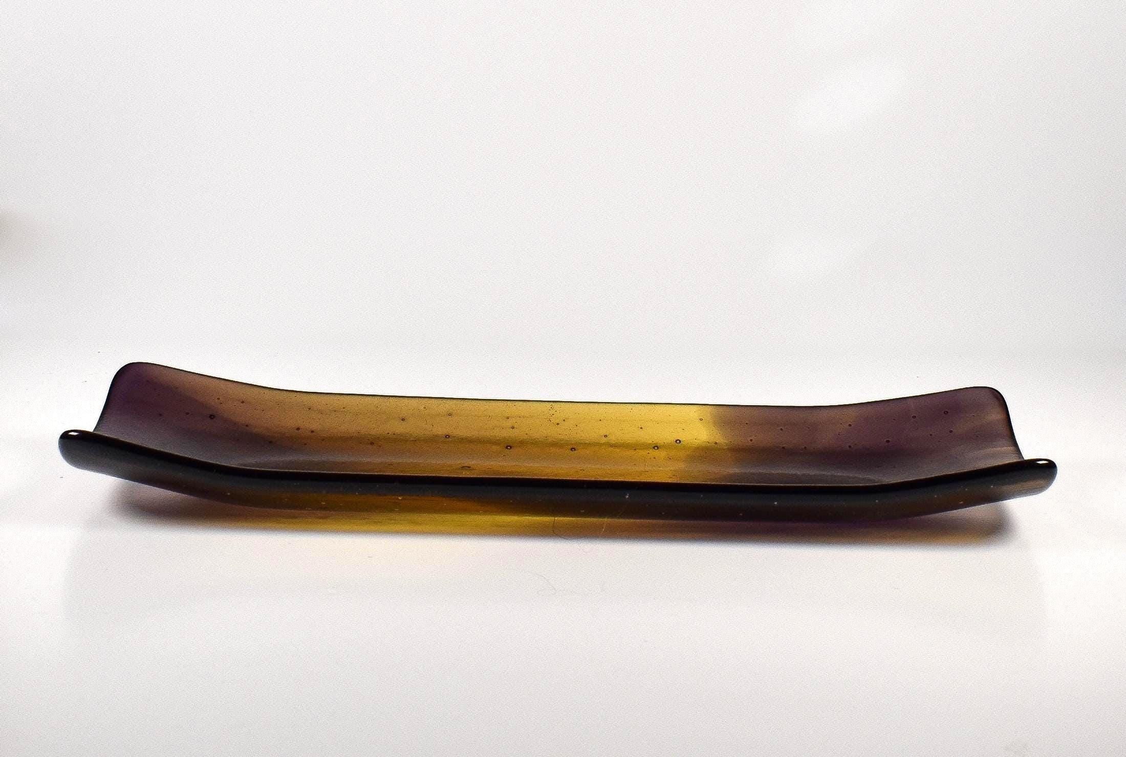 Front end view of the tray showing the shallow trough profile and translucent gold-to-purple gradient.