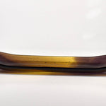 Front end view of the tray showing the shallow trough profile and translucent gold-to-purple gradient.