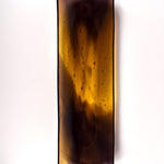 Top-down view of a 12” x 4” fused glass channel tray with transparent gold center and deep purple edges on white background.