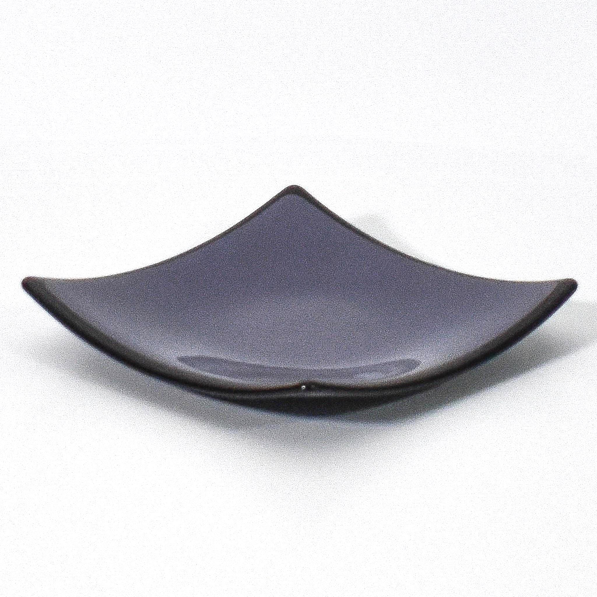 Square shaped, purple glass dish with black trim and slightly raised corners, on a white surface.