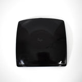 The black underside of square shaped fused glass tray.