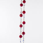 Large cranberry red jade stones beaded with glass and crystals, hanging vertically against white background.